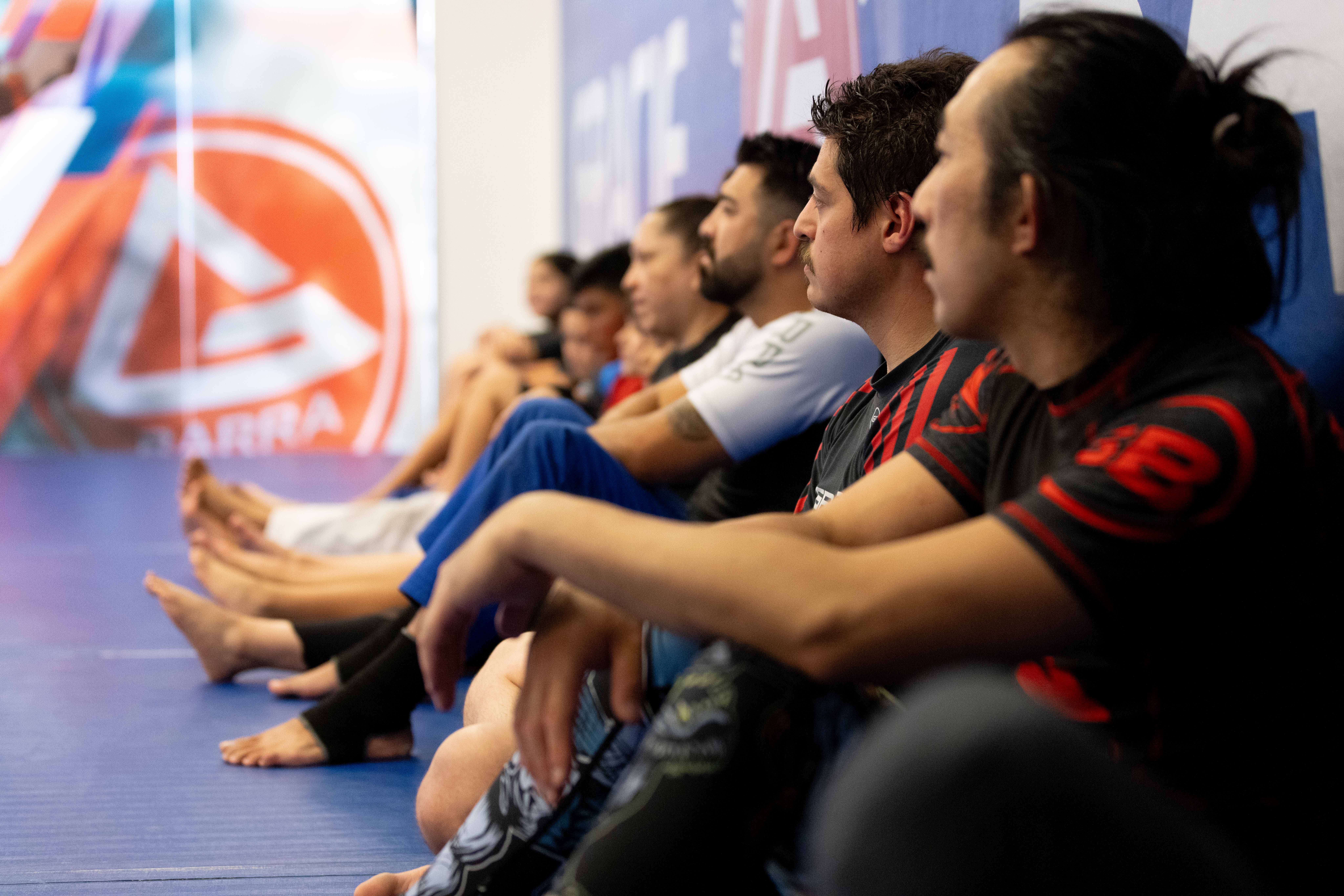 Adults drilling Brazilian Jiu-Jitsu fundamentals at Gracie Barra Whittier